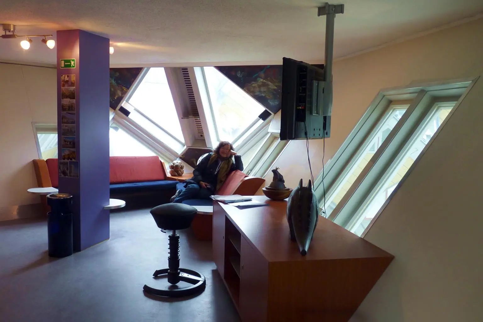 Living room of a Cube House in Rotterdam with slanted walls and tilted windows